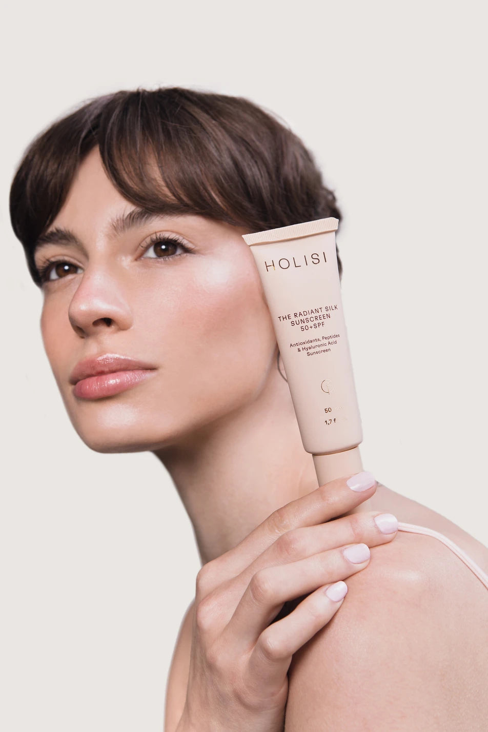 The Radiant Silk Sunscreen 50+ spf- Protección solar antiedad